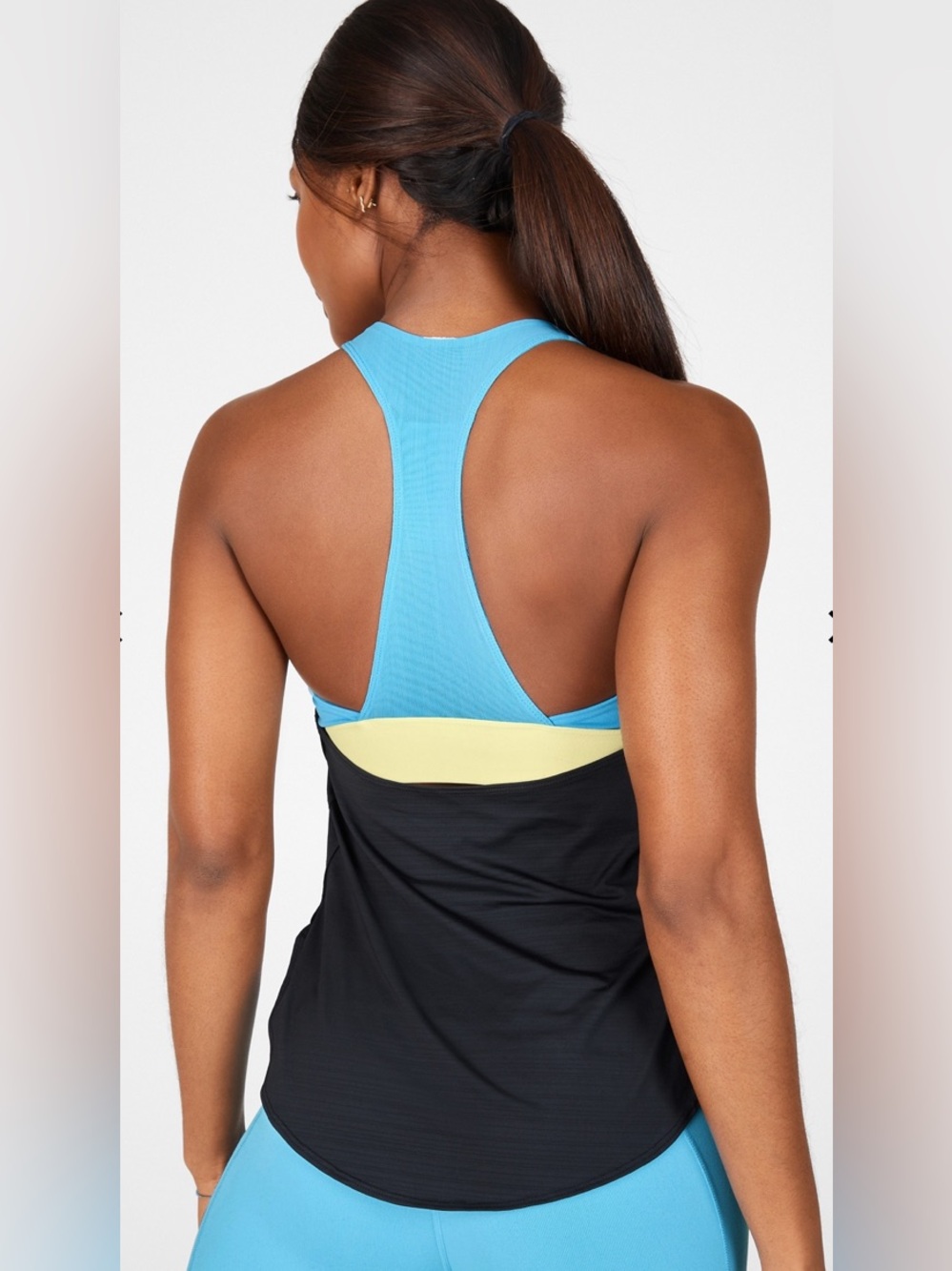 Fabletics Eco-Conscious Built-In Bra Tank in a Black/Light Cerulean/Lemon Crème